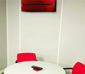 R32 A/C model in red, installed inside the room