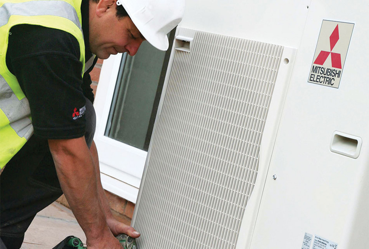 Mitsubishi Electric Accredited engineer working on unit v2 Mitsubishi Electric Accredited engineer working on unit v2