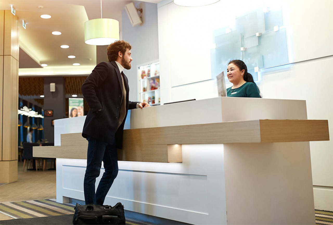 Man at hotel reception